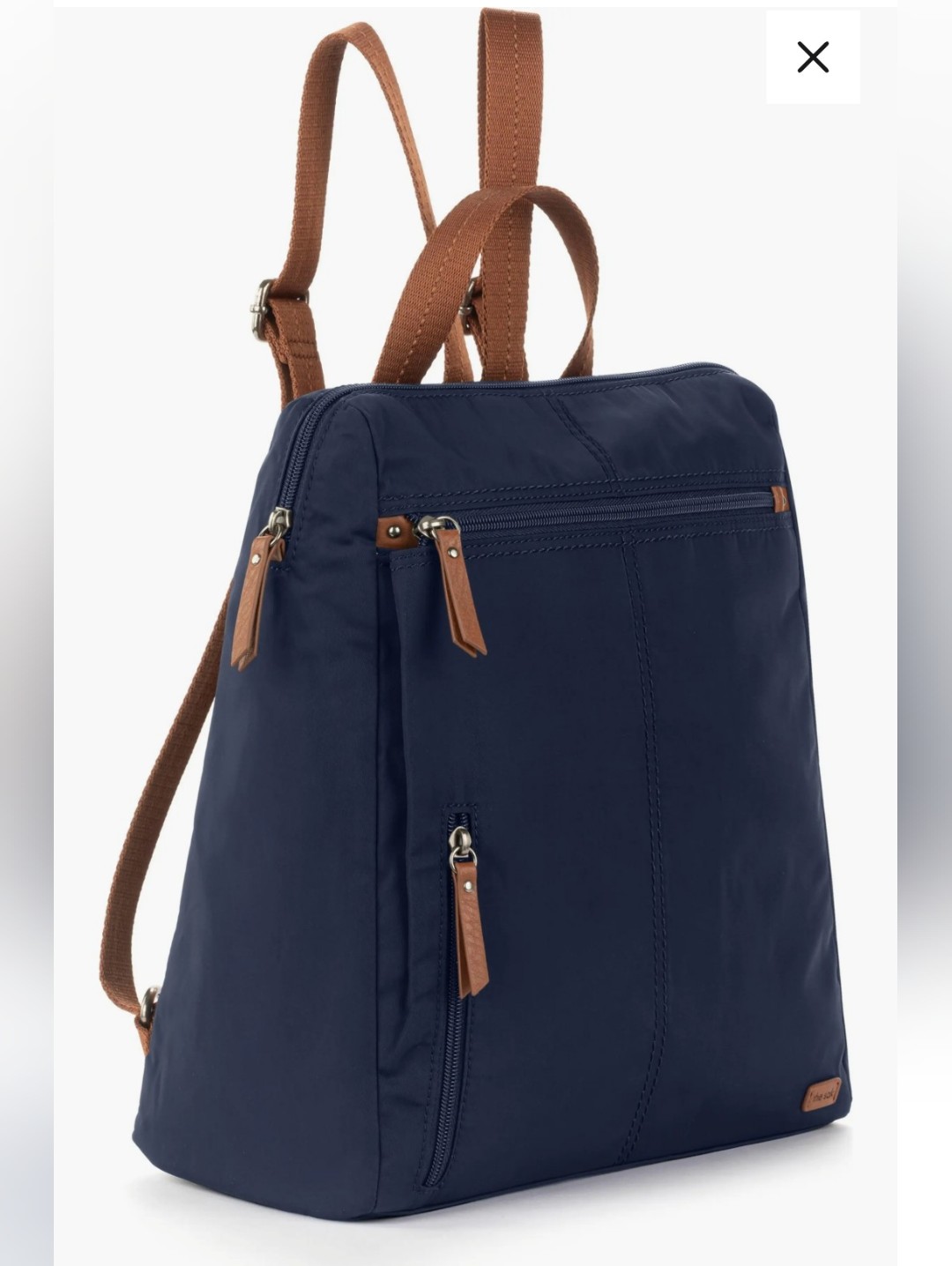 The Sak Navy Backpack With Brown Trim And Straps